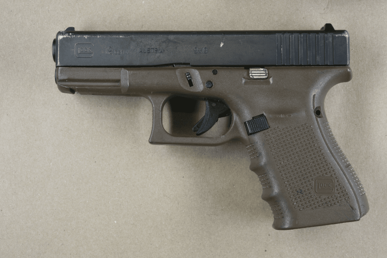 Suspects brown and black handgun