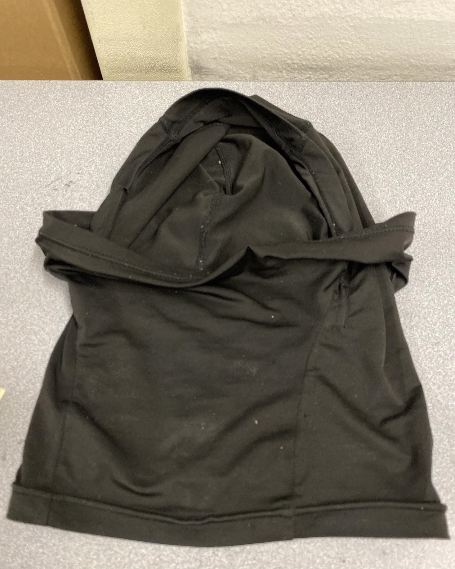 lack ski mask seized as suspected evidence of a robbery crime.