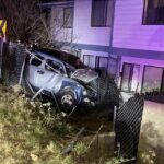 Vehicle crashed into side of building in West Seattle.