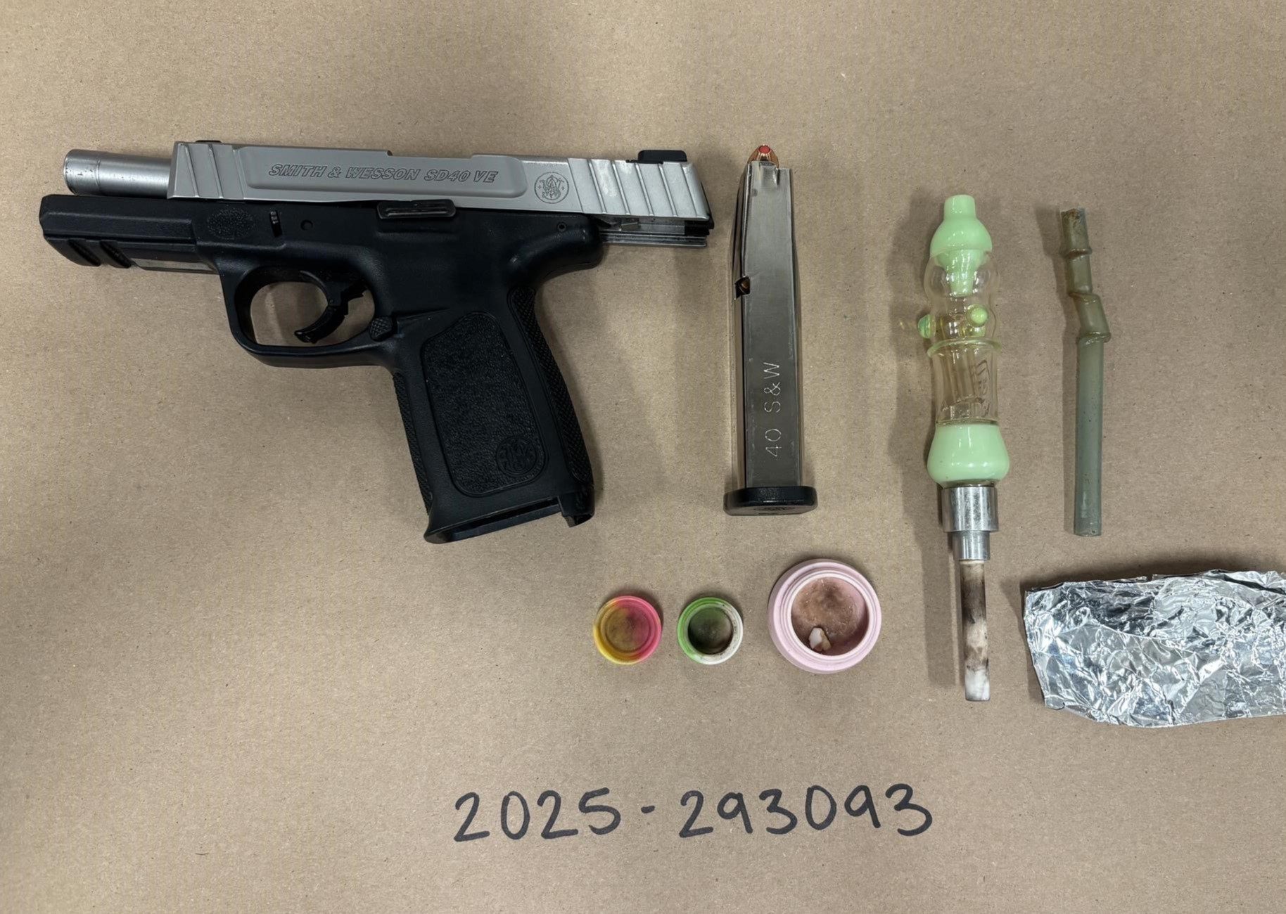 Seattle police recover firearm, 0.2g Fentanyl, narcotic paraphernalia during arrest.