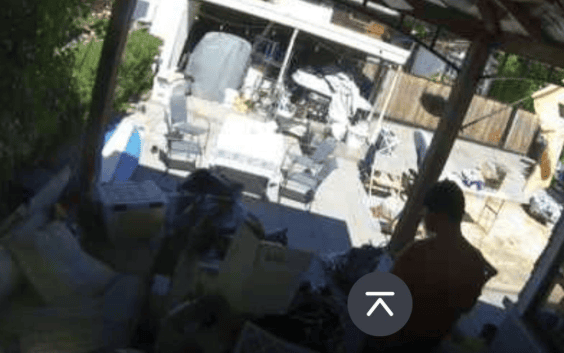 security video footage screenshot of burglary suspect